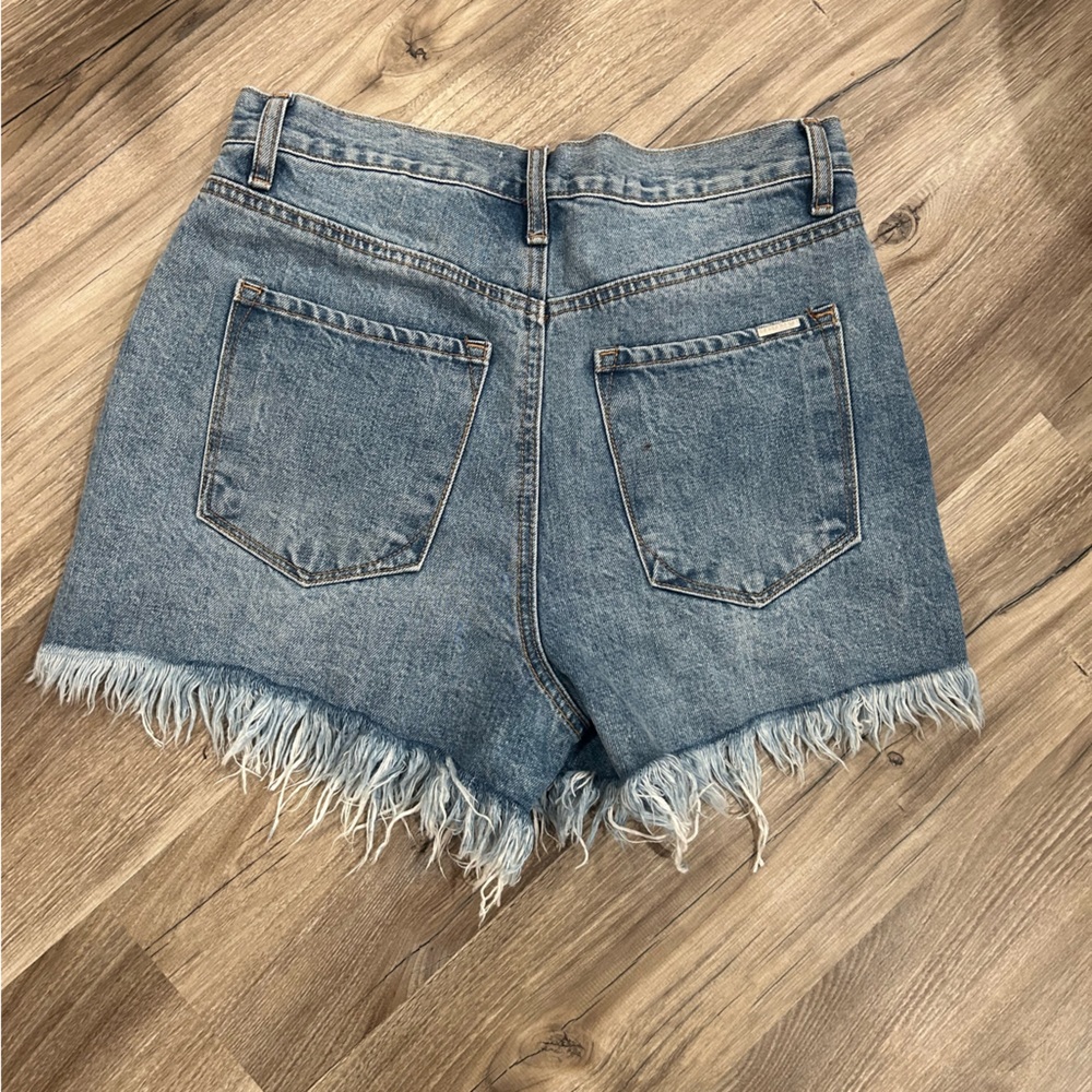 68. Blue and White High-Waisted Jean Shorts with Distressed Detailing - Picture 5 of 6